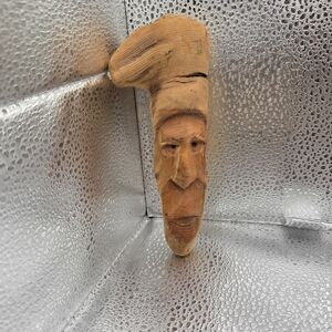Hand-Carved Wooden Face Sculpture